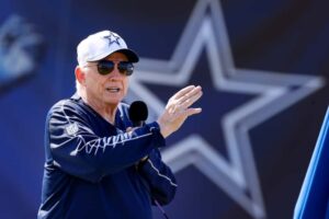 After two weeks of training, Jerry Jones, the owner of the Cowboys, has seen who?