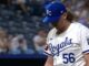 Royals reliever Hunter Harvey was placed on the 15-day injured list after experiencing mid-back tightness.