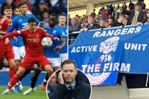 "Ibrox Controversy: Rangers Fan's Nazi Flag Display Linked to Flute Band Drummer