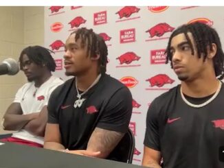 Arkansas football players speak to the media following the Hogs win against Auburn