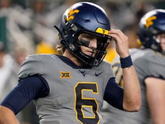 WVU Star Quarterback Garrett Greene Demands Action: ‘I Can’t Be on the Bench Anymore